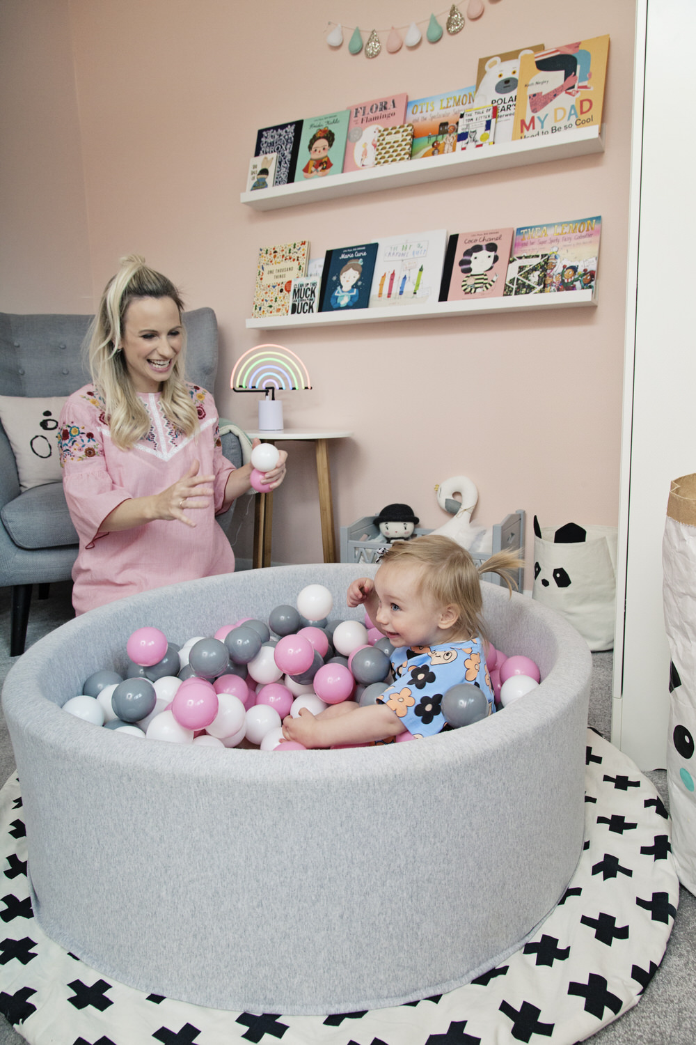 Pink and Grey Ball Pool |A pastel and monochrome nursery for a little girl with details from The Modern Nursery.
