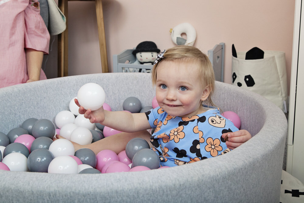Pink and Grey Ball Pool A pastel and monochrome nursery for a little girl with details from The Modern Nursery.