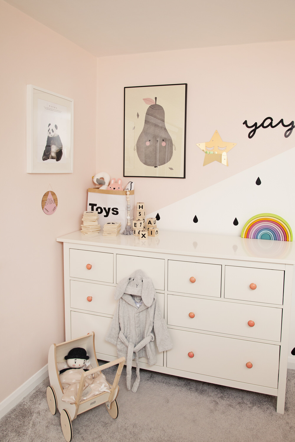 White chest of drawers | Rainbow Toy | A pastel and monochrome nursery for a little girl with details from The Modern Nursery.