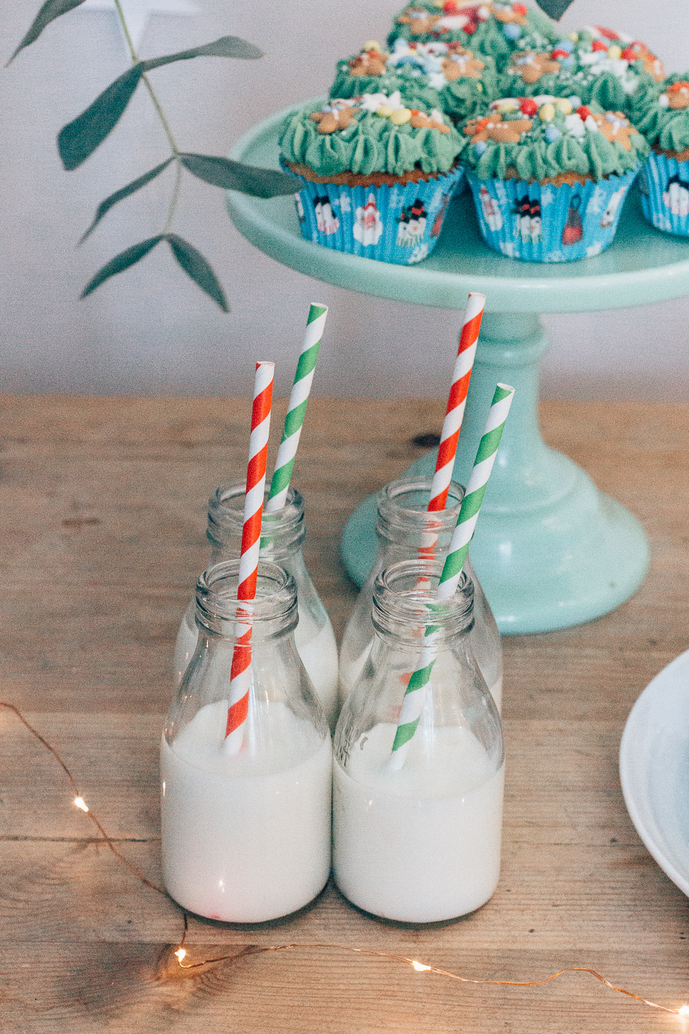 Mini milk bottles with festive paper straws