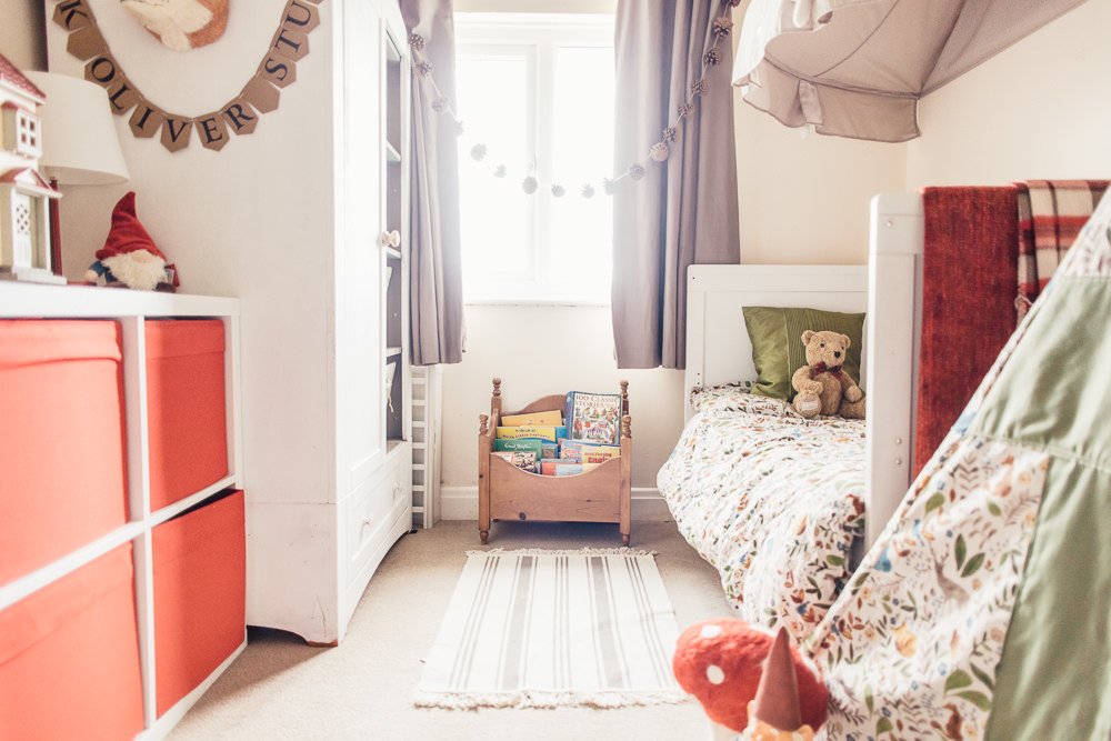 A woodland inspired children's bedroom in a rented property with homemade decor and details.