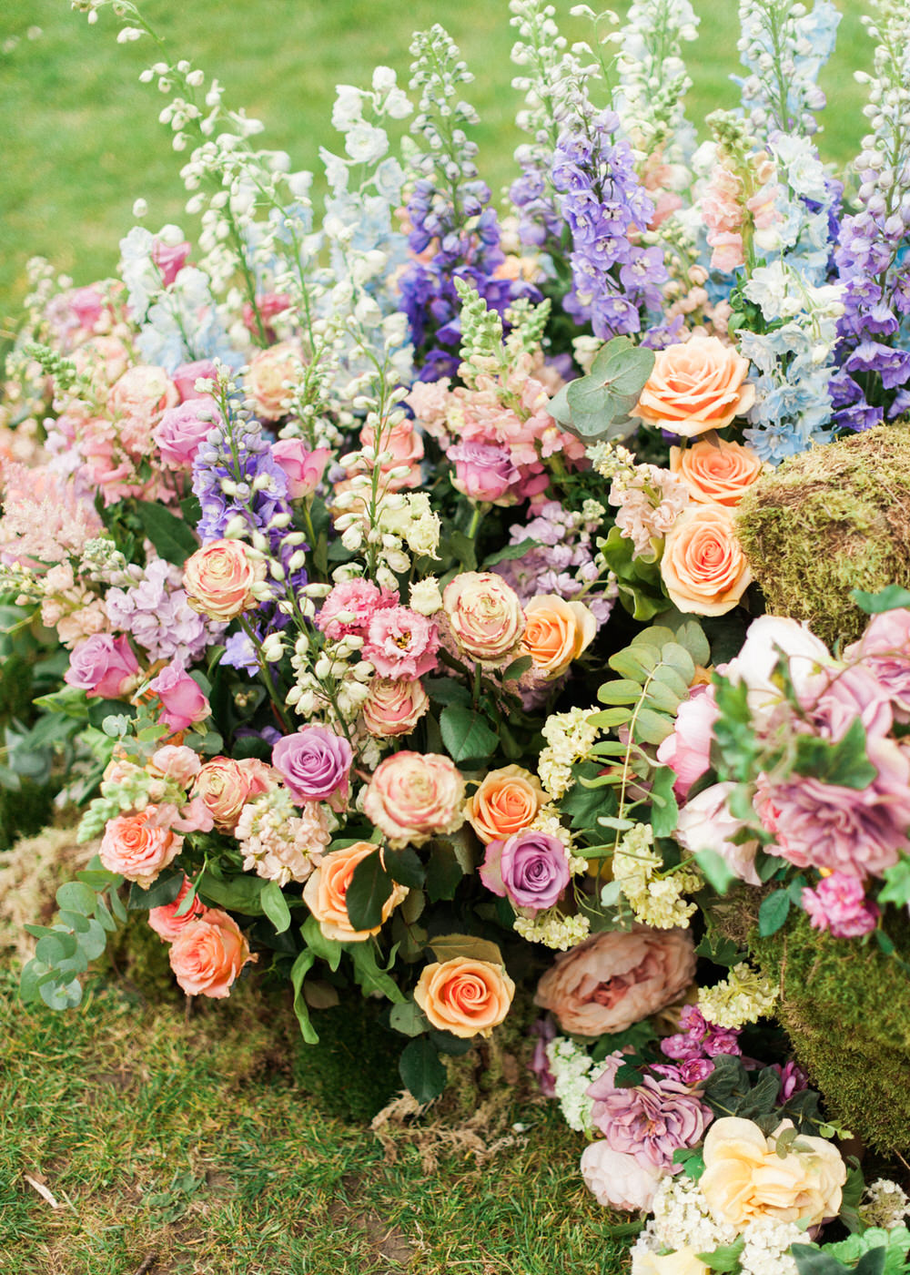 Floral Centrepieces | Peach, Pink and Purple Flowers | A Midsummer nights dream inspired children's birthday party with stunning floral, fairy entertainment, crafts and a picnic. Photos by Kate Nielen.