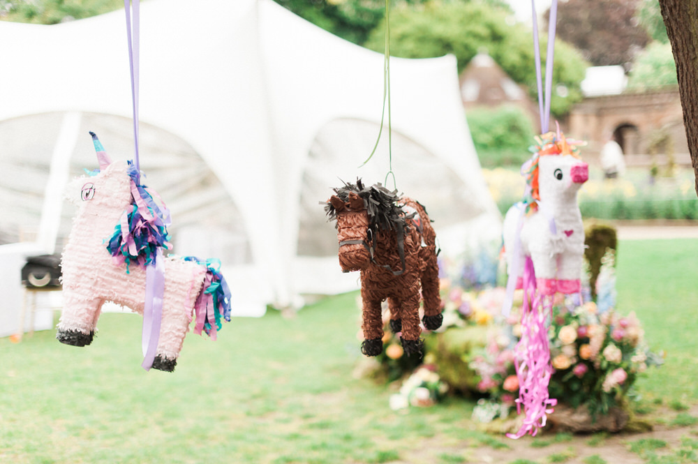 Pinatas | A Midsummer nights dream inspired children's birthday party with stunning floral, fairy entertainment, crafts and a picnic. Photos by Kate Nielen.