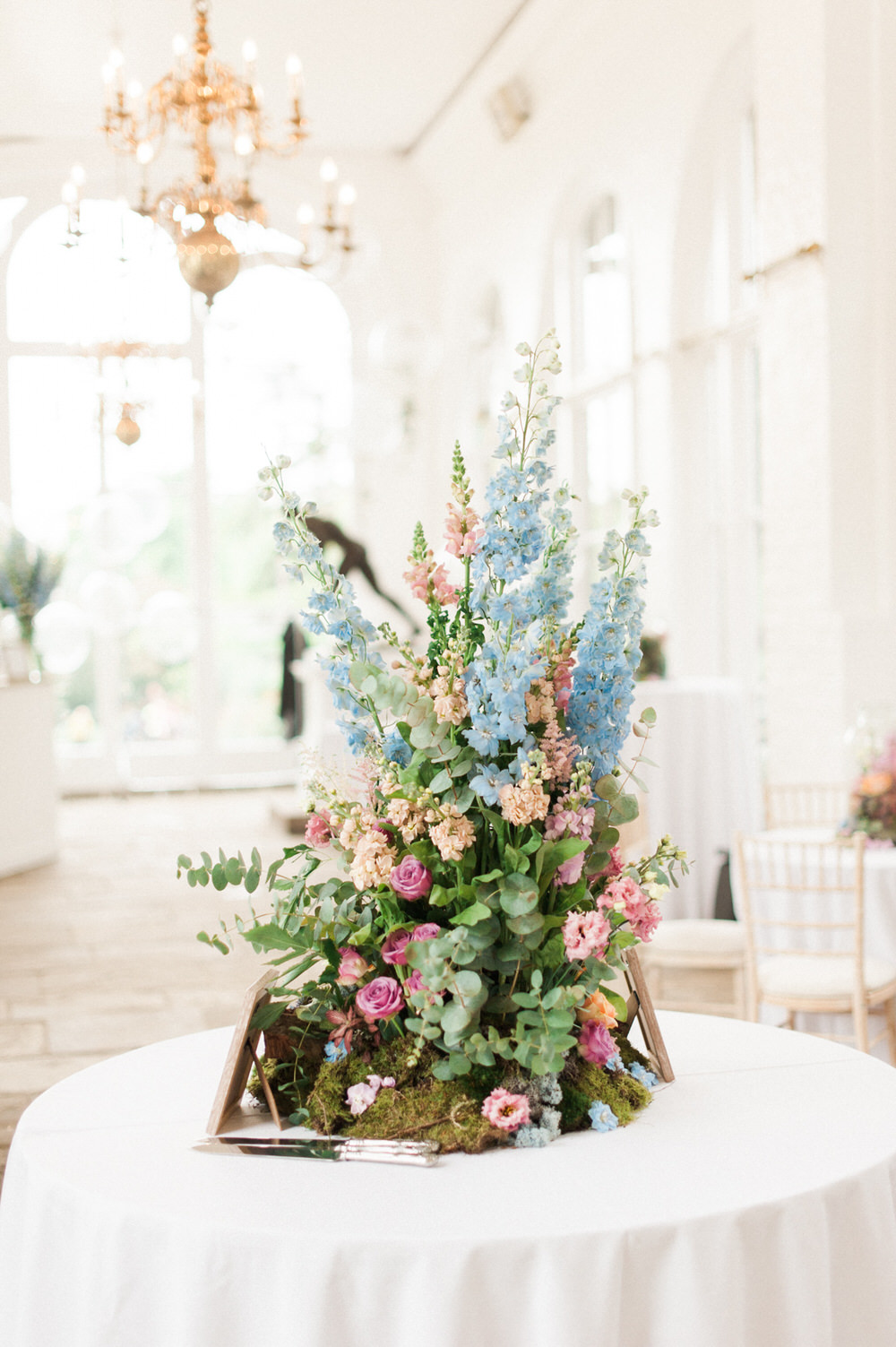 Floral centrepieces | | Purple, blue and peace flowers | Wildflower centrepiece | Summer florals | Childrens Party | A Midsummer nights dream inspired children's birthday party with stunning floral, fairy entertainment, crafts and a picnic. Photos by Kate Nielen.