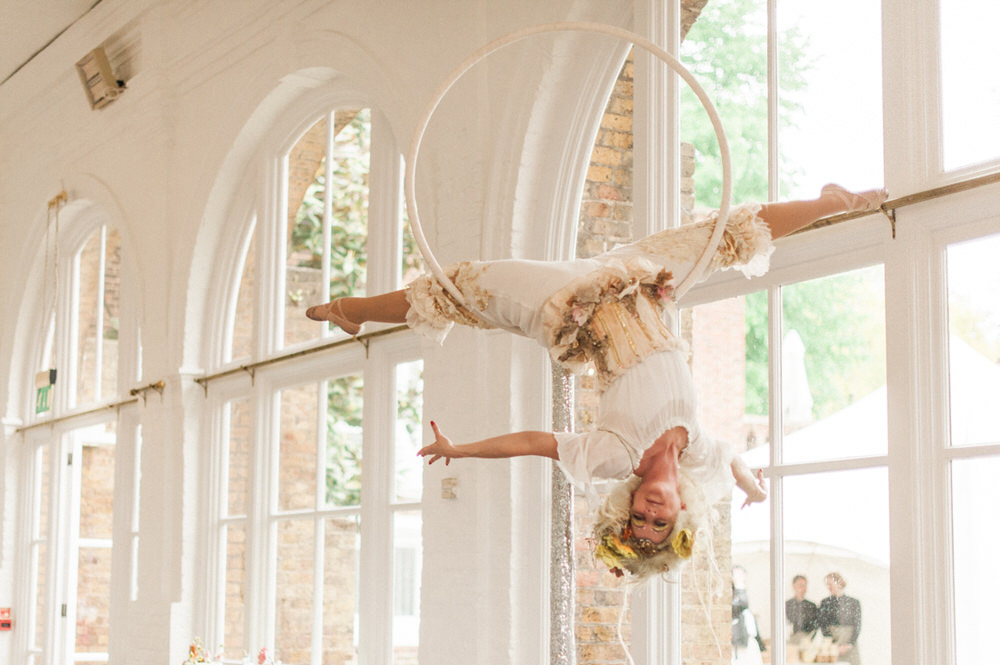 Aerial Acrobats | A Midsummer nights dream inspired children's birthday party with stunning floral, fairy entertainment, crafts and a picnic. Photos by Kate Nielen.
