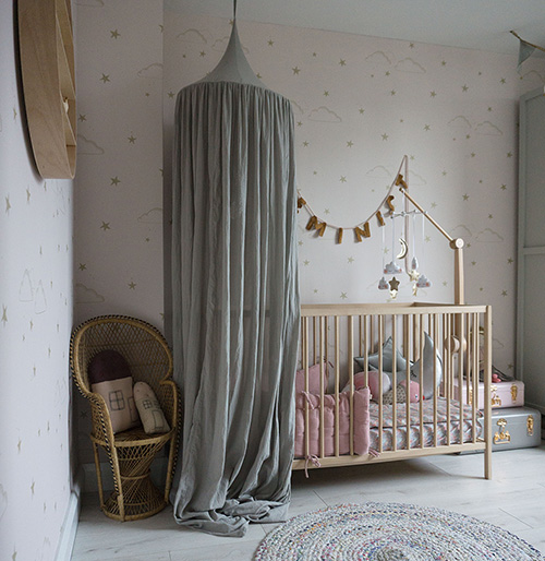 Pretty and magical nursery with grey canopy and Velveteen Babies decor